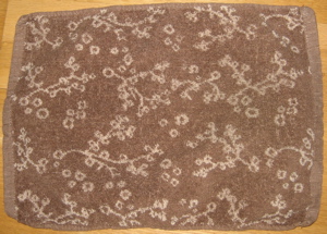 Brown flowery washcloth